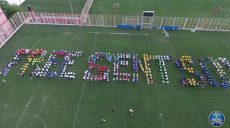 Харьковские налоговики выстроились с плакатами на стадионе (видео)