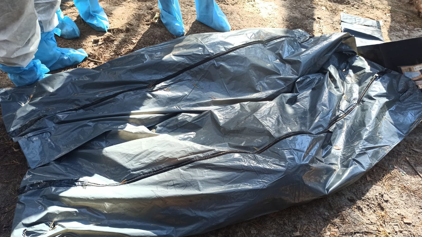 З місця масового поховання в Ізюмі вилучено 263 тіла загиблих